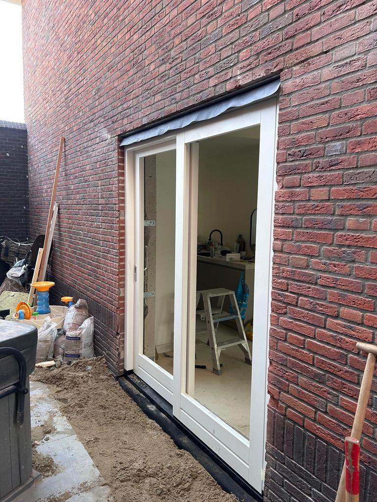 Na: Nieuwe schuifpui in de doorbraak
